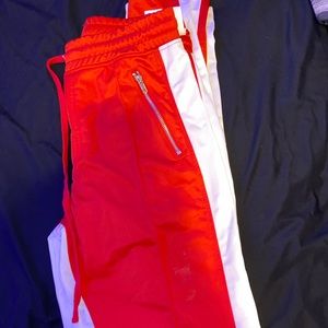 brand new red and white track pants